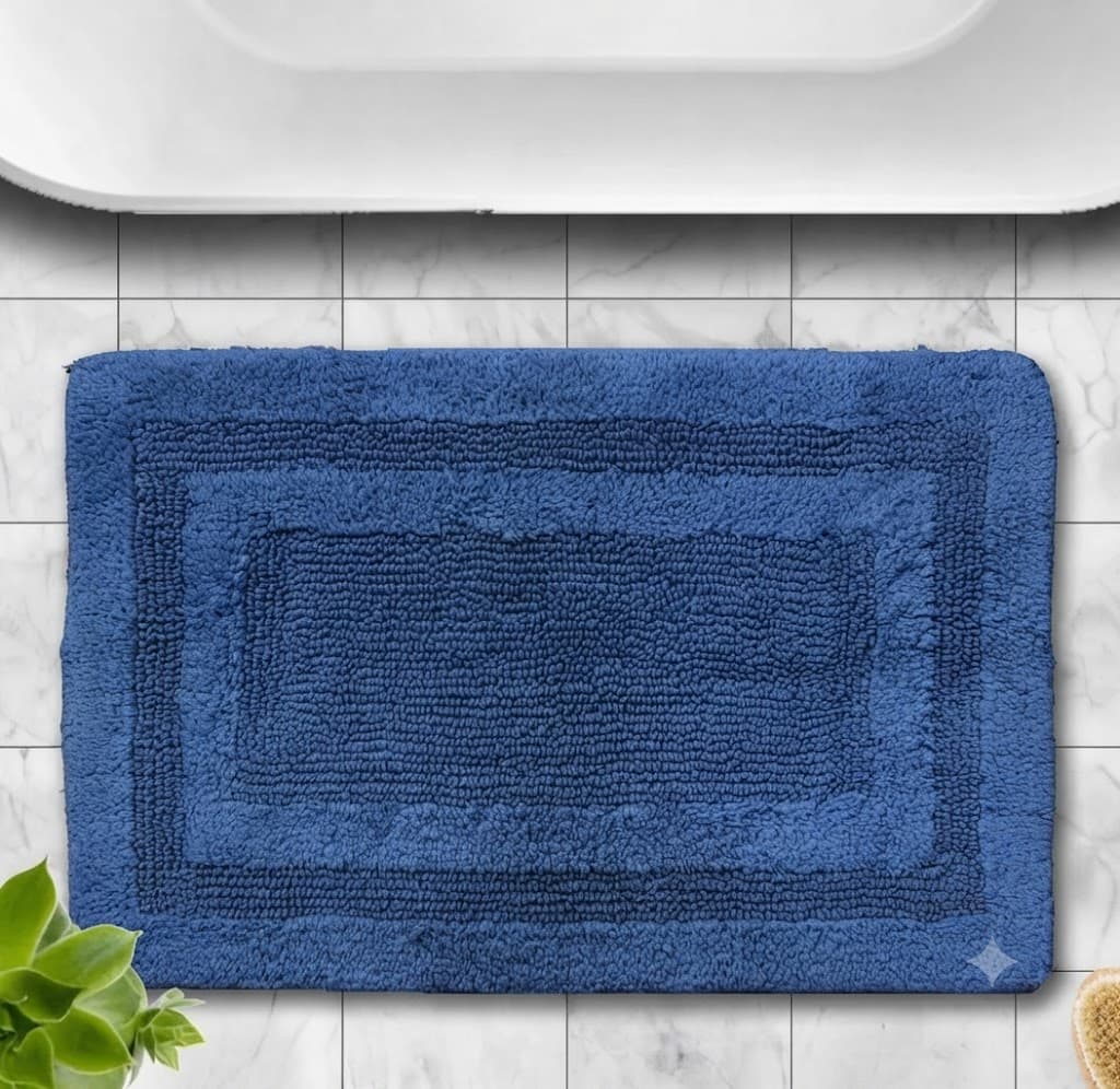 Plush Blue Bath Mat with Textured Border Design
